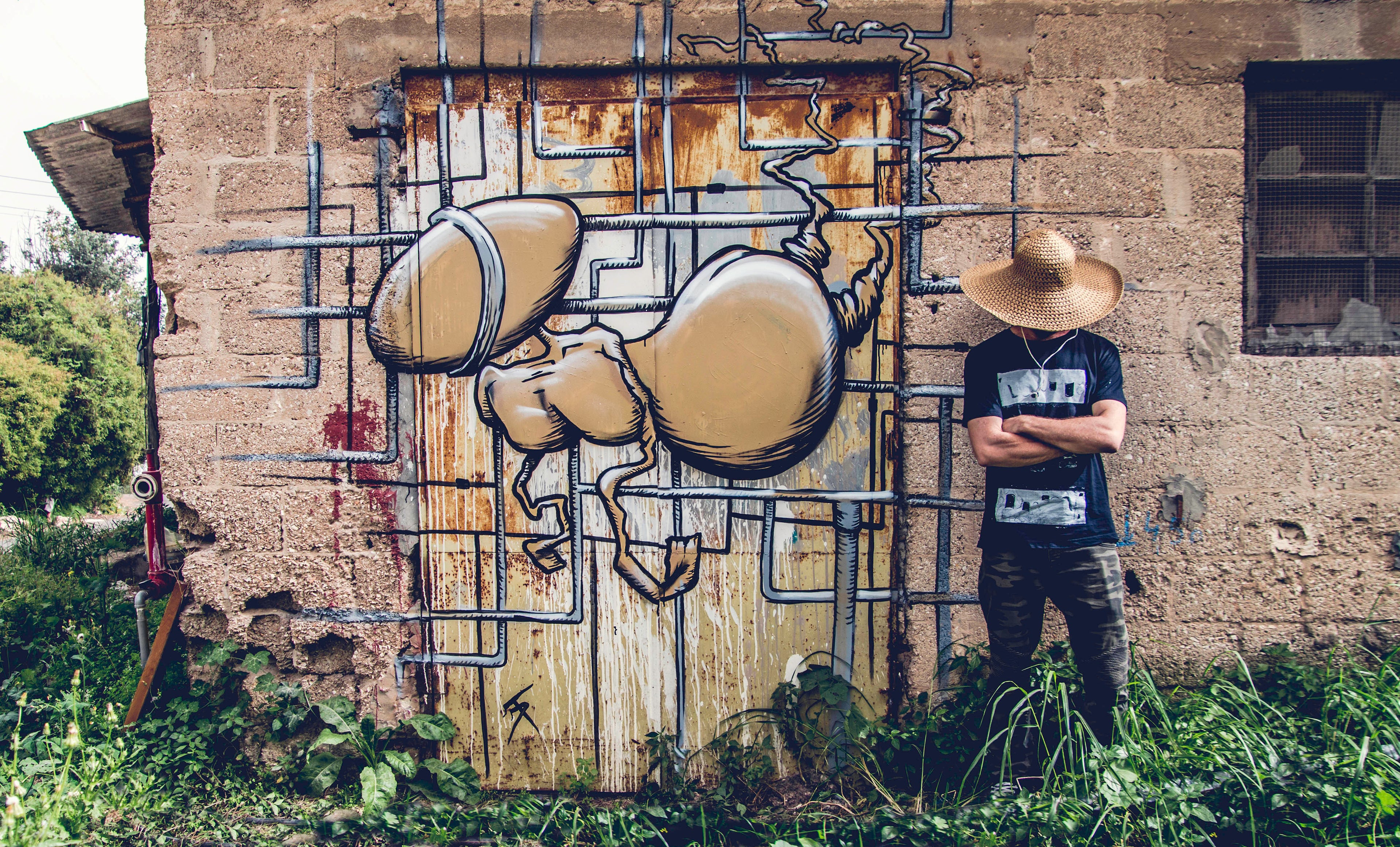 Damian Tab street art mural in Tivon 2019 featuring Hanged man 