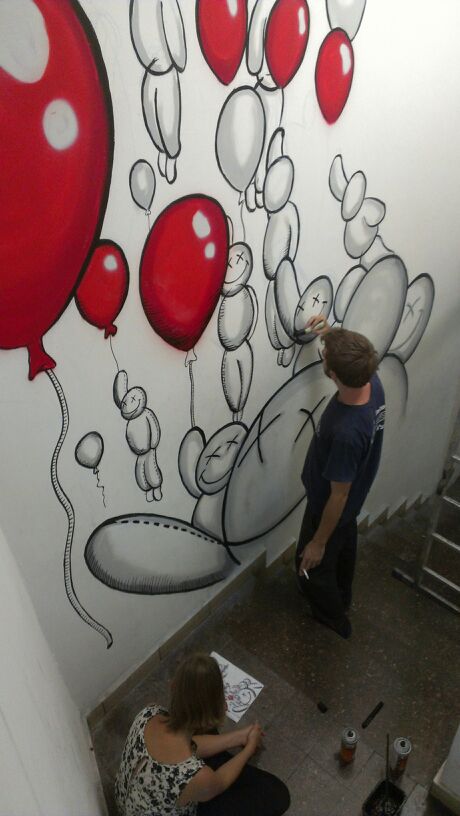 Damian Tab painting street art mural Ballonz in Tel Aviv Central bus station